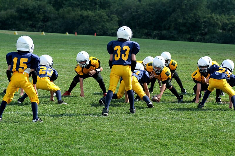 bambini che giocano a rugby